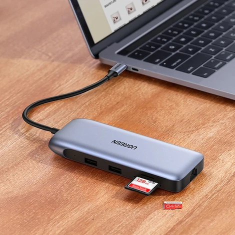 Ugreen multifunkcionális HUB 9 az 1-ben USB Type C - HDMI, DP, VGA, 2 x USB, RJ45 Ethernet, SD / TF kártyaolvasó, USB Type C PD, 100 W, szürke (CM274)